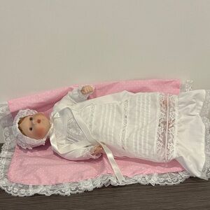 Elegant White Porcelain Baby Doll with Pink Blanket